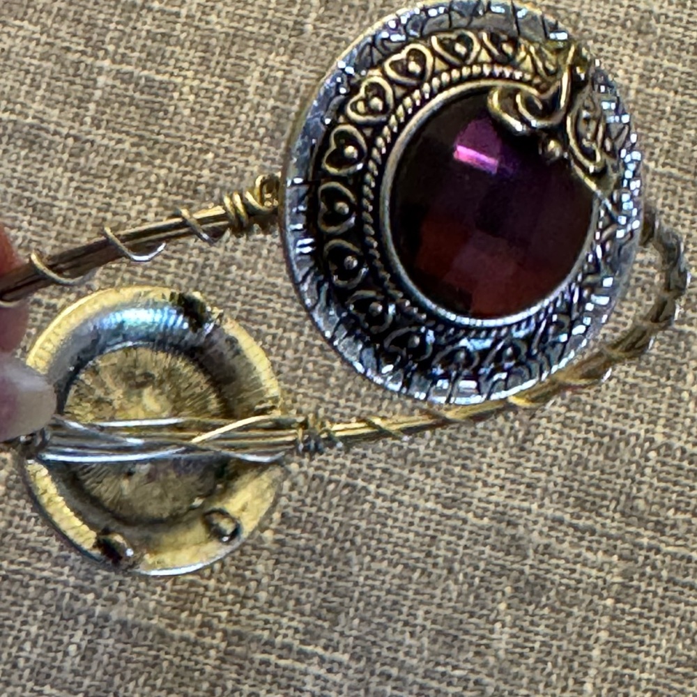 Bracelet Featuring 2 Ornate Silver Filigree Setting With Faceted Purple Glass